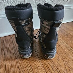 Camo color just like new worn once.  Perfect condition snow/apres ski boots.